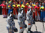 Chinese astronauts (from left) Wang Yaping, mission commander Nie Haisheng and Zhang Xiaoguang gesture as they prepare to board the Shenzhou-10 spacecraft in Jiuquan, China, on Tuesday.