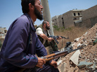 Syrian rebel fighters hold a position Thursday in the northwestern town of Maaret al-Numan. At least 93,000 people, including more than 6,500 children, have been killed in Syria's civil war. Syrian rebel fighters hold a position Thursday in the northwestern town of Maaret al-Numan. At least 93,000 people, including more than 6,500 children, have been killed in Syria's civil war.