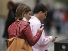 People use cellphones in downtown San Francisco. The city's district attorney and New York's attorney general plan to meet with major cellphone manufacturers, as they push the industry to do more to protect consumers from violent street crimes connected to cellphone thefts. People use cellphones in downtown San Francisco. The city's district attorney and New York's attorney general plan to meet with major cellphone manufacturers, as they push the industry to do more to protect consumers from violent street crimes connected to cellphone thefts.
