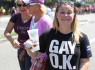 A new survey of more than 1,000 lesbian, gay, bisexual, and transgender adults finds that more than 90 percent feel more accepted in society than they did 10 years ago. Here, a woman displays her pro-gay T-shirt at the L.A. Pride Parade in West Hollywood last Sunday. A new survey of more than 1,000 lesbian, gay, bisexual, and transgender adults finds that more than 90 percent feel more accepted in society than they did 10 years ago. Here, a woman displays her pro-gay T-shirt at the L.A. Pride Parade in West Hollywood last Sunday.