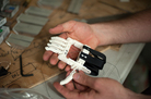 The newest version of the Robohand is made of snap-together parts, reducing the amount of hardware needed. The newest version of the Robohand is made of snap-together parts, reducing the amount of hardware needed.