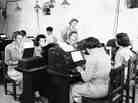 Teletype operators relay U.S. military communications in North Africa during World War II. Teletype operators relay U.S. military communications in North Africa during World War II.