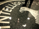 A man walks across the seal of the Central Intelligence Agency at the CIA headquarters. A man walks across the seal of the Central Intelligence Agency at the CIA headquarters.
