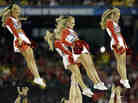 University of Louisville cheerleaders hurled into the air during the first half of the NCAA Final Four tournament college basketball semifinal game against Wichita State in April. University of Louisville cheerleaders hurled into the air during the first half of the NCAA Final Four tournament college basketball semifinal game against Wichita State in April.