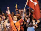 Turkish mothers wave the national flag during a vigil on Friday in memory of those killed during recent demonstrations in Istanbul's Taksim Square. Turkish mothers wave the national flag during a vigil on Friday in memory of those killed during recent demonstrations in Istanbul's Taksim Square.
