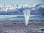 A Google balloon sails through the air with the Southern Alps in the background, in Tekapo, New Zealand, on Monday.