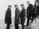 The Beatles pose in Liverpool's Derby Square in February 1963 — the year, according to author Colin Fleming, that yielded the band's most definitive work.