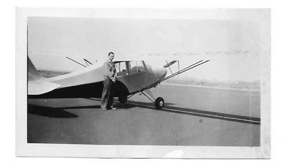 Louis Parsons in his late teens, circa 1946, standing beside an Aeronca Champion airplane, a typical trainer plane for aspiring post-war private pilots. Louis Parsons in his late teens, circa 1946, standing beside an Aeronca Champion airplane, a typical trainer plane for aspiring post-war private pilots.