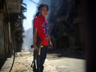 A Syrian boy holds an AK-47 assault rifle in the majority-Kurdish Sheikh Maqsud district of the northern Syrian city of Aleppo in April. A Syrian boy holds an AK-47 assault rifle in the majority-Kurdish Sheikh Maqsud district of the northern Syrian city of Aleppo in April.