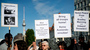 Protesters demonstrate in Berlin on Tuesday on the eve of President Obama's visit to the German capital. Obama is expected to encounter a more skeptical Germany in talks on trade and secret surveillance practices.