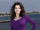 Nigella Lawson's husband has been cautioned by police after photos emerged of him with his hands around her neck. Lawson, a cookbook author and TV food personality, has not commented publicly.