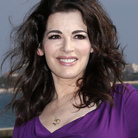 Nigella Lawson's husband has been cautioned by police after photos emerged of him with his hands around her neck. Lawson, a cookbook author and TV food personality, has not commented publicly. Nigella Lawson's husband has been cautioned by police after photos emerged of him with his hands around her neck. Lawson, a cookbook author and TV food personality, has not commented publicly.
