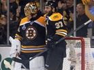 Patrice Bergeron #37 of the Boston Bruins celebrates with Tuukka Rask #40 after defeating the Chicago Blackhawks 2-0 in Game 3 of the NHL Stanley Cup Final at TD Garden Monday night in Boston. Patrice Bergeron #37 of the Boston Bruins celebrates with Tuukka Rask #40 after defeating the Chicago Blackhawks 2-0 in Game 3 of the NHL Stanley Cup Final at TD Garden Monday night in Boston.