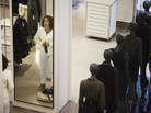A woman tries on a jacket at a Zara store in Madrid. Zara's parent company, Inditex, was among Spanish companies to sign fire and building safety agreements for their factories in Bangladesh following a deadly factory collapse in April, though Inditex was not directly involved in that incident. A woman tries on a jacket at a Zara store in Madrid. Zara's parent company, Inditex, was among Spanish companies to sign fire and building safety agreements for their factories in Bangladesh following a deadly factory collapse in April, though Inditex was not directly involved in that incident.
