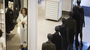A woman tries on a jacket at a Zara store in Madrid. Zara's parent company, Inditex, was among Spanish companies to sign fire and building safety agreements for their factories in Bangladesh following a deadly fire in April.