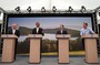 The G-8 leaders speaking at this news conference in Northern Ireland all lost their ties, but British Prime Minister David Cameron went a step further by ditching his jacket and rolling up his sleeves.