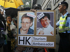 A supporter holds a sign with pictures of Edward Snowden, the former National Security Agency contractor who leaked details about the agency's surveillance programs, and Hong Kong movie star Jackie Chan during a protest outside the Consulate General of the United States in Hong Kong on June 15. Snowden has been holed up in Hong Kong since the leaks. A supporter holds a sign with pictures of Edward Snowden, the former National Security Agency contractor who leaked details about the agency's surveillance programs, and Hong Kong movie star Jackie Chan during a protest outside the Consulate General of the United States in Hong Kong on June 15. Snowden has been holed up in Hong Kong since the leaks.