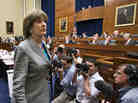 Lois Lerner, head of the IRS unit that decides whether to grant tax-exempt status to groups, leaves a House Oversight and Government Reform Committee hearing in May.