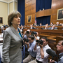 Lois Lerner, head of the IRS unit that decides whether to grant tax-exempt status to groups, leaves a House Oversight and Government Reform Committee hearing in May.