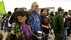 Oglala Lakota activist Debra White Plume (left), tribal president Bryan Brewer (center) and other protesters create a blockade to prevent trucks from delivering beer to a liquor store in Whiteclay, Neb. The town, which borders the Pine Ridge Reservation, has been the site of recurring protests over alcohol. Oglala Lakota activist Debra White Plume (left), tribal president Bryan Brewer (center) and other protesters create a blockade to prevent trucks from delivering beer to a liquor store in Whiteclay, Neb. The town, which borders the Pine Ridge Reservation, has been the site of recurring protests over alcohol.