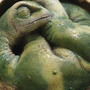 Kind of cute. But pretty stupid. A scale model of a baby sauropod in its egg.
