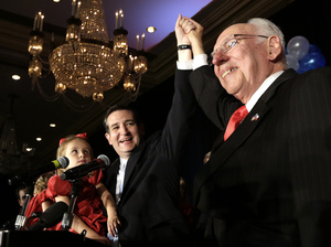 Ted Cruz celebrates his victory in the Texas Senate race with his father, Rafael, and daughter Caroline on Nov. 6, 2012, in Houston. Ted Cruz celebrates his victory in the Texas Senate race with his father, Rafael, and daughter Caroline on Nov. 6, 2012, in Houston.