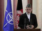 Afghan President Hamid Karzai speaks during a ceremony Tuesday at a military academy on the outskirts of Kabul.