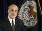 Federal Reserve Chairman Ben Bernanke said Wednesday that a fall in the unemployment rate would not automatically trigger a rise in interest rates. He spoke to the media after the central bank issued a policy update. Federal Reserve Chairman Ben Bernanke said Wednesday that a fall in the unemployment rate would not automatically trigger a rise in interest rates. He spoke to the media after the central bank issued a policy update.