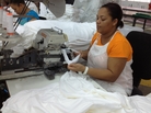 Aracelis Upia Montero works at the Alta Gracia garment factory in the Dominican Republic. She says she was desperately poor before she began working at the factory, which pays much higher than usual wages. "I'm now eligible for loans and credits from the bank because I earn a good salary," she says. Aracelis Upia Montero works at the Alta Gracia garment factory in the Dominican Republic. She says she was desperately poor before she began working at the factory, which pays much higher than usual wages. "I'm now eligible for loans and credits from the bank because I earn a good salary," she says.