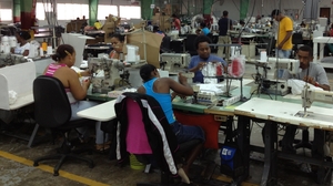 Workers at Alta Gracia garment factory make around $500 a month, far above the industry average, though the company has yet to break even since it opened three years ago. Its apparel is sold at hundreds of college bookstores in the U.S.