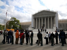 People line up to enter the Supreme Court building on April 22, when the court heard arguments in the Agency for International Development v. Alliance for Open Society International case. People line up to enter the Supreme Court building on April 22, when the court heard arguments in the Agency for International Development v. Alliance for Open Society International case.