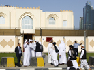 Guests arrive for the opening ceremony of the new Taliban political office in Doha on June 18. Guests arrive for the opening ceremony of the new Taliban political office in Doha on June 18.
