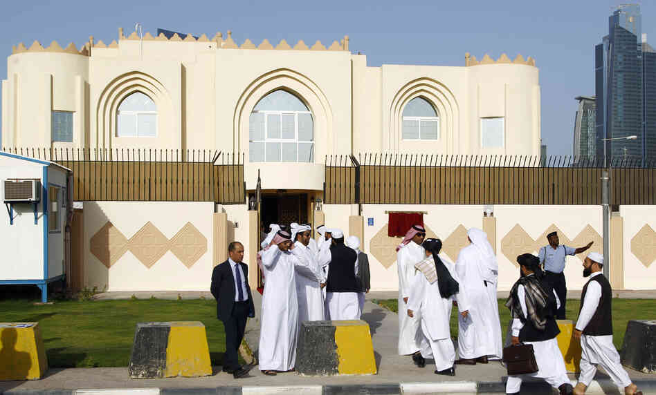 Guests arrive for the opening ceremony of the new Taliban political office in Doha on June 18. Guests arrive for the opening ceremony of the new Taliban political office in Doha on June 18.