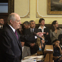 Illinois Gov. Pat Quinn speaks with reporters at the Capitol in 2011 after signing legislation abolishing the death penalty in the state.