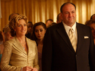 James Gandolfini as Tony Soprano and Edie Falco as his wife, Carmella, in a scene from The Sopranos. Gandolfini died of cardiac arrest in Italy, according to reports citing a doctor at the hospital where was admitted. James Gandolfini as Tony Soprano and Edie Falco as his wife, Carmella, in a scene from The Sopranos. Gandolfini died of cardiac arrest in Italy, according to reports citing a doctor at the hospital where was admitted.
