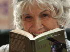 Alice Munro holds up one of her books as she receives the Man Booker International award at Trinity College Dublin on June 25, 2009. Alice Munro holds up one of her books as she receives the Man Booker International award at Trinity College Dublin on June 25, 2009.
