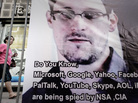 A woman in Hong Kong walks past a banner displayed in support of Edward Snowden this week. A woman in Hong Kong walks past a banner displayed in support of Edward Snowden this week.