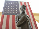 Lincoln Walks at Midnight stands outside the state capitol in Charleston, W.Va. The statue depicts President Abraham Lincoln contemplating the prospect of statehood for West Virginia. Lincoln Walks at Midnight stands outside the state capitol in Charleston, W.Va. The statue depicts President Abraham Lincoln contemplating the prospect of statehood for West Virginia.