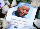 A print of Nelson Mandela and get well messages lay outside the home of the former President Mandela in Johannesburg, South Africa earlier this month. A print of Nelson Mandela and get well messages lay outside the home of the former President Mandela in Johannesburg, South Africa earlier this month.