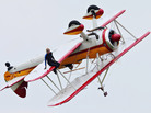 Wing walker Jane Wicker performs at the Vectren Air Show just before crashing on Saturday. She and pilot Charlie Schwenker were killed. Wing walker Jane Wicker performs at the Vectren Air Show just before crashing on Saturday. She and pilot Charlie Schwenker were killed.
