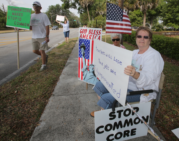 Tea Party members protest Common Core in Ocala, Fla., in April. The new educational standards, adopted by almost all the states, are the object of a growing conservative backlash. (Image credit: Ocala Star-Banner /Landov)