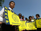Supporters of the NAACP hold signs outside the Supreme Court building on Tuesday. The court ruled that Section 4 of the Voting Rights Act, which aimed at protecting minority voters, is unconstitutional. Supporters of the NAACP hold signs outside the Supreme Court building on Tuesday. The court ruled that Section 4 of the Voting Rights Act, which aimed at protecting minority voters, is unconstitutional.