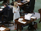 State Sen. Wendy Davis, a Fort Worth Democrat, dons pink tennis shoes during a Tuesday filibuster. State Sen. Wendy Davis, a Fort Worth Democrat, dons pink tennis shoes during a Tuesday filibuster.