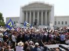 One of the attorneys in the California Proposition 8 case, David Boies (center), speaks outside the Supreme Court as he's surrounded by plaintiffs in the case, couples Paul Katami (from left) and Jeff Zarrillo, and Sandy Stier and Kris Perry. One of the attorneys in the California Proposition 8 case, David Boies (center), speaks outside the Supreme Court as he's surrounded by plaintiffs in the case, couples Paul Katami (from left) and Jeff Zarrillo, and Sandy Stier and Kris Perry.