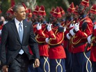 President Obama reviews an honor guard on Wednesday outside the presidential palace in Dakar, Senegal. President Obama reviews an honor guard on Wednesday outside the presidential palace in Dakar, Senegal.