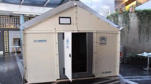 ...into a temporary shelter that is designed to last up to three years and provide electricity via solar panels.