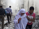 A Syrian woman is evacuated after being wounded in shelling by regime forces in the Shaar neighborhood of the northern Syrian city of Aleppo, on Oct. 13, 2012. A Syrian woman is evacuated after being wounded in shelling by regime forces in the Shaar neighborhood of the northern Syrian city of Aleppo, on Oct. 13, 2012.