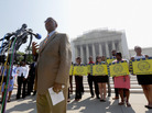 Field director Charles White of the NAACP speaks at a podium outside the U.S. Supreme Court on Tuesday. The court ruled that a key part of the Voting Rights Act is unconstitutional. Field director Charles White of the NAACP speaks at a podium outside the U.S. Supreme Court on Tuesday. The court ruled that a key part of the Voting Rights Act is unconstitutional.
