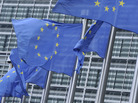 European Union flags fly in front of the organization's headquarters in Brussels. European Union flags fly in front of the organization's headquarters in Brussels.