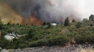Firefighters are seen working on the Yarnell Hill fire, in this photograph from this weekend provided by the Arizona State Forestry Division. Officials say 19 firefighters died battling the blaze Sunday.